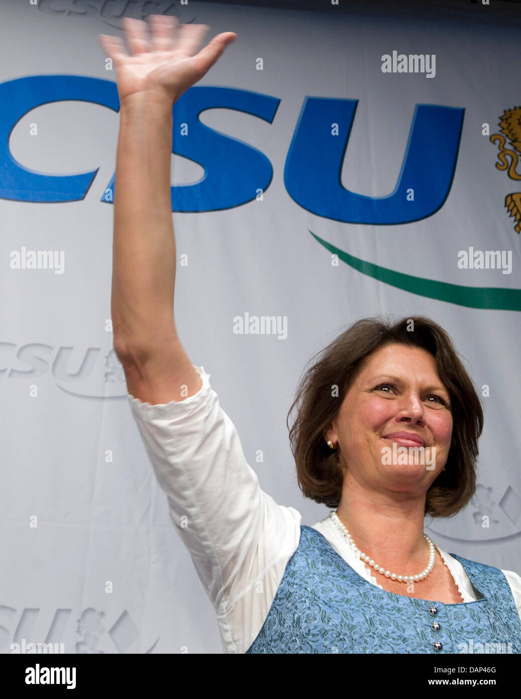Federal Minister for Agriculture, Ilse Aigner, cheers after being elected as the chairwoman of the district meeting Oberbayern at the CSU-district meeting 2011 Oberbayern in Traunreut, Germany, 23 July 2011. Never before, the CSU-District Association had a female chairperson. Photo: Peter Kneffel Stock Photo