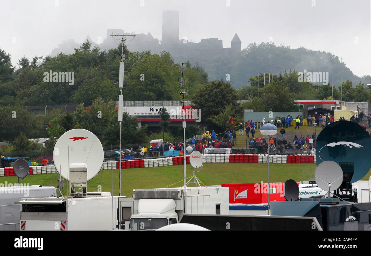 The castle of Nürburg is seen behind the track prior to the Formula One Grand Prix of Germany at the F1 race track of Nuerburgring, Nuerburg, Germany, 24 July 2011. Photo: Jens Büttner dpa/lrs Stock Photo