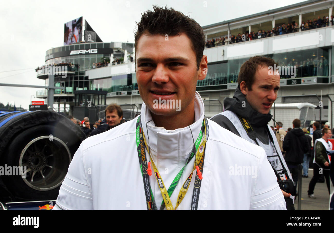 German golfer Martin Kaymer seen at the grid prior to the Formula One Grand Prix of Germany at the F1 race track of Nuerburgring, Nuerburg, Germany, 24 July 2011. Photo: Jens Büttner dpa/lrs Stock Photo
