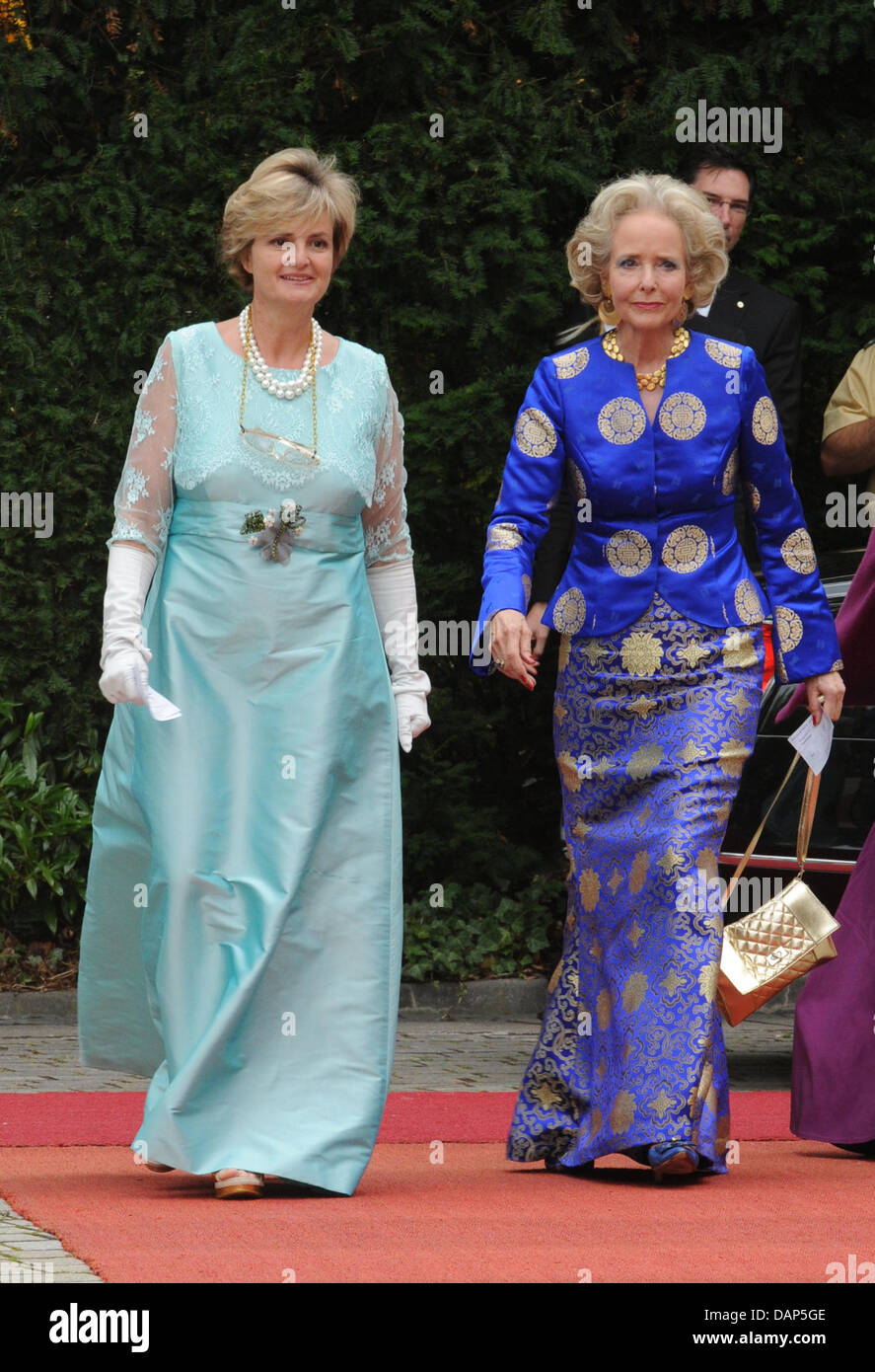 Princess Gloria von Thurn und Taxis (L) and Isa Countess of Hardenberg (C) arrive at the opening of the Bayreuth Festival 2011 in Bayreuth, Germany, 25 July 2011. The 100th festival opens with the opera 'Tannhaeuser'. The one-month festival is Germany's most prestigious culture event and devoted to operas by Richard Wagner. Photo: Ursula Düren dpa/lby Stock Photo