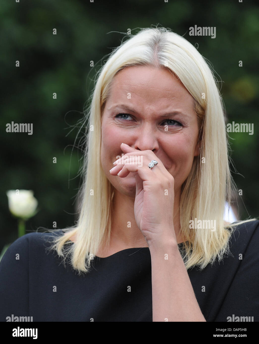 Norwegian crownprincess Mette-Marit are taking part of the rose walk in Oslo, Norway, 25 July 2011. The Norwegian man charged in last week's attacks in Norway, which claimed at least 76 lives, was Monday remanded in custody for eight weeks by Oslo district court. A. B. Breivik was charged with the bombing in Oslo's government district on Friday and a shooting at a youth camp on nea Stock Photo