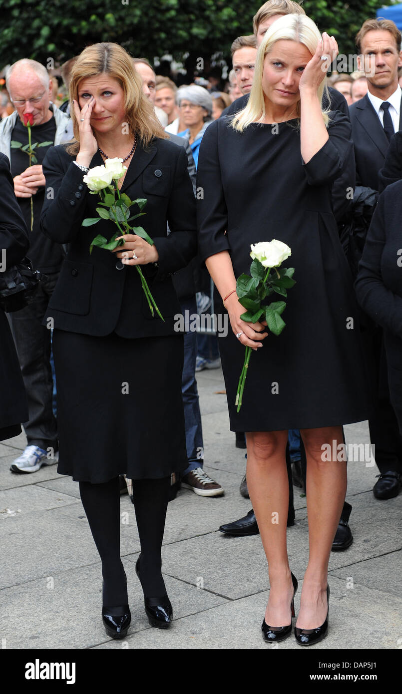 Crownprincess Mette-Marit (r) and princess Märtha Louise taking part of the rose walk in Oslo, Norway, 25 July 2011. The Norwegian man charged in last week's attacks in Norway, which claimed at least 76 lives, was Monday remanded in custody for eight weeks by Oslo district court. A. B. Breivik was charged with the bombing in Oslo's government district on Friday and a shooting at a  Stock Photo