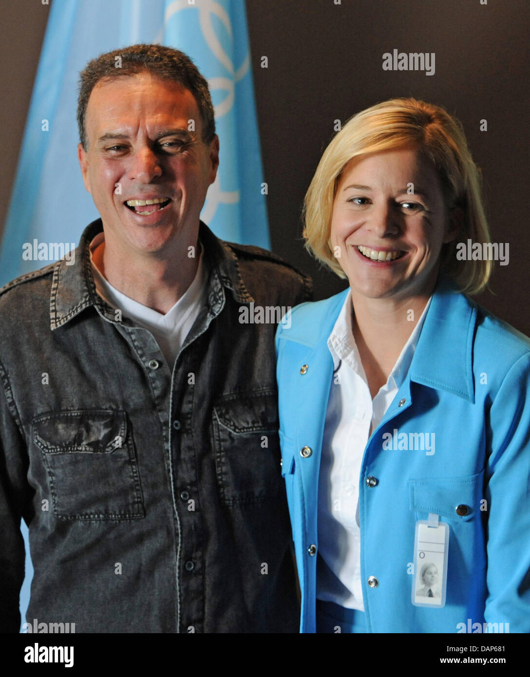 Director Dror Zahavi (L) from Israel and actress Schauspielerin Bernadette Heerwagen (as Anna Gerbers) pose during an on-set photo shoot of the Second German Television ZDF film 'Muenchen 72' ('Munich 72') in Munich, Germany, 27 July 2011. The movie is shot at original sites and deals with the  Munich massacre of 1972 Olympics, in which Israeli athletes had been taken hostage. Phot Stock Photo
