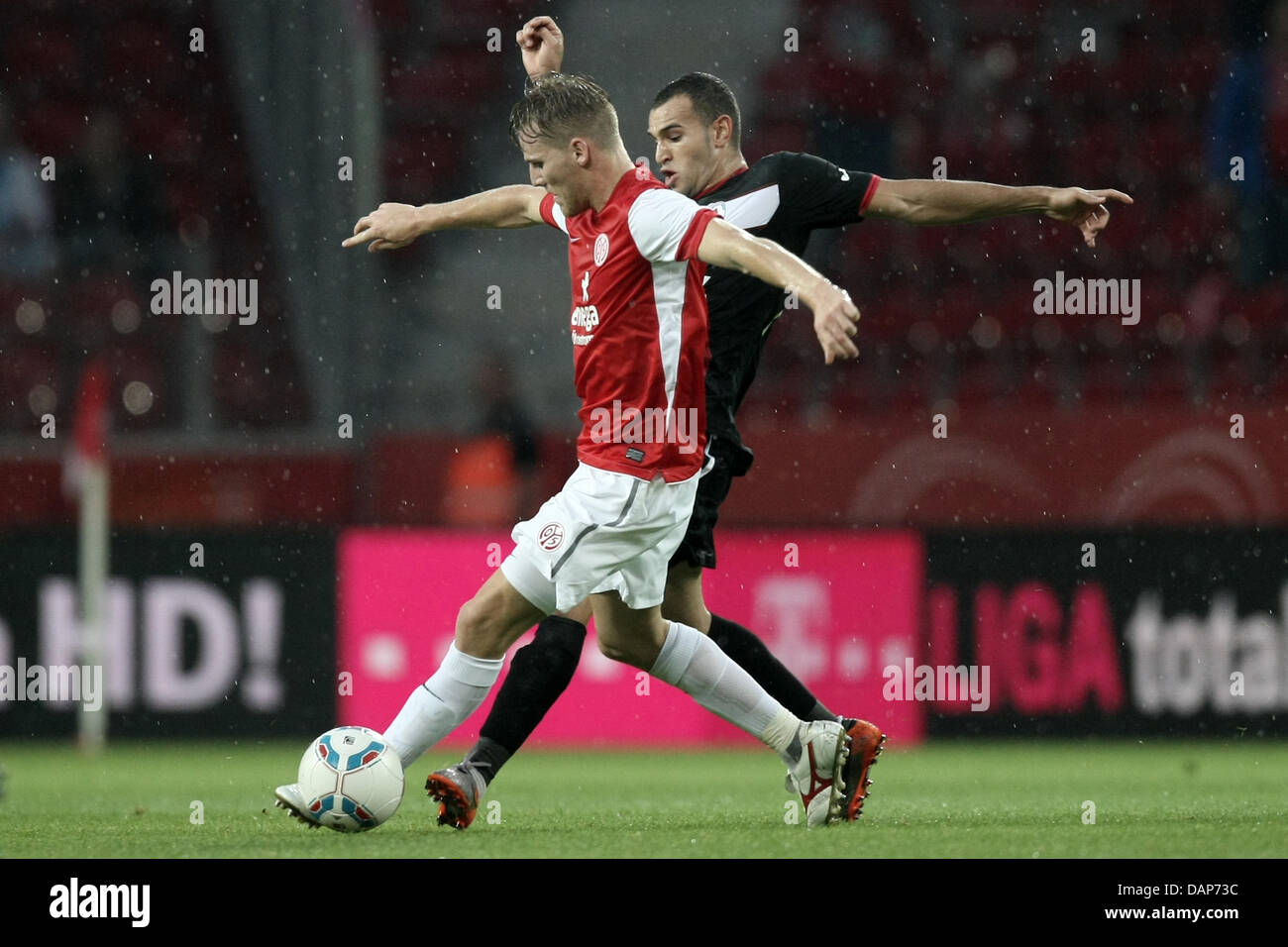 Mainz S Eugen Polanski L And Medias Taher Bawab Vie For The Ball Stock Photo Alamy