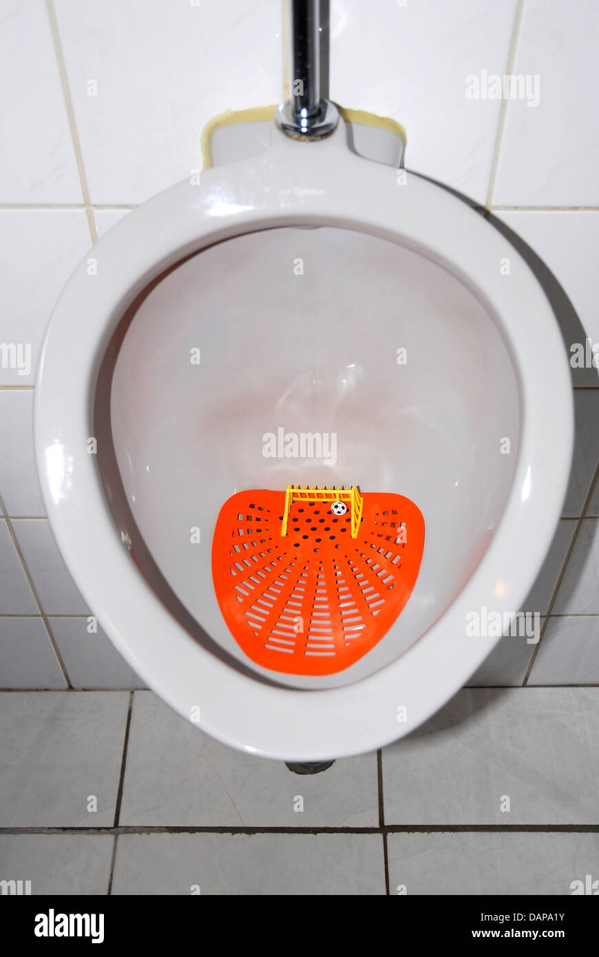 Netherlands, Urinal with soccer goal and football Stock Photo Alamy