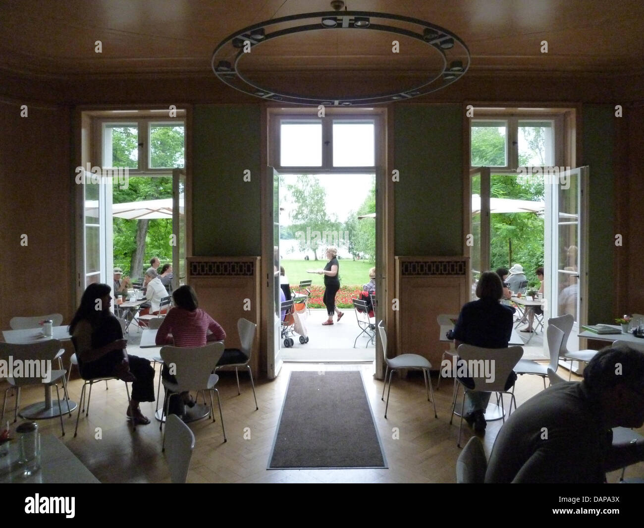 Visitors Sit In The Lounge Area In The Villa Of German Painter Max