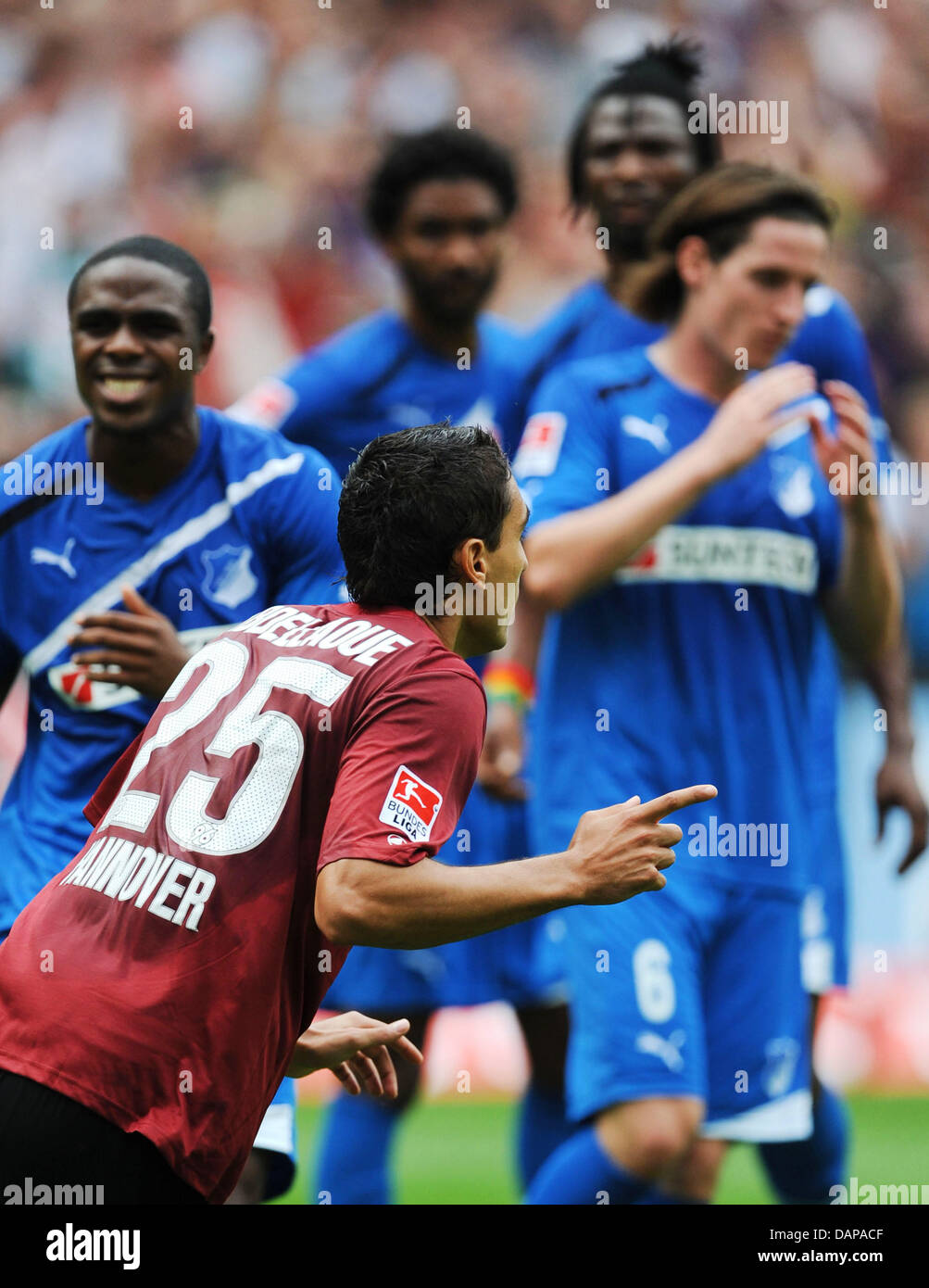 Hanover's Mohammed Abdellaoue (L) celebrates his 2:1 goal during the German Bundesliga match Hannover 96 vs. 1899 Hoffenheim at AWD-Arena in Hanover, Germany, 06 August 2011. Photo: PETER STEFFEN (ATTENTION: EMBARGO CONDITIONS! The DFL permits the further utilisation of the pictures in IPTV, mobile services and other new technologies only no earlier than two hours after the end of  Stock Photo