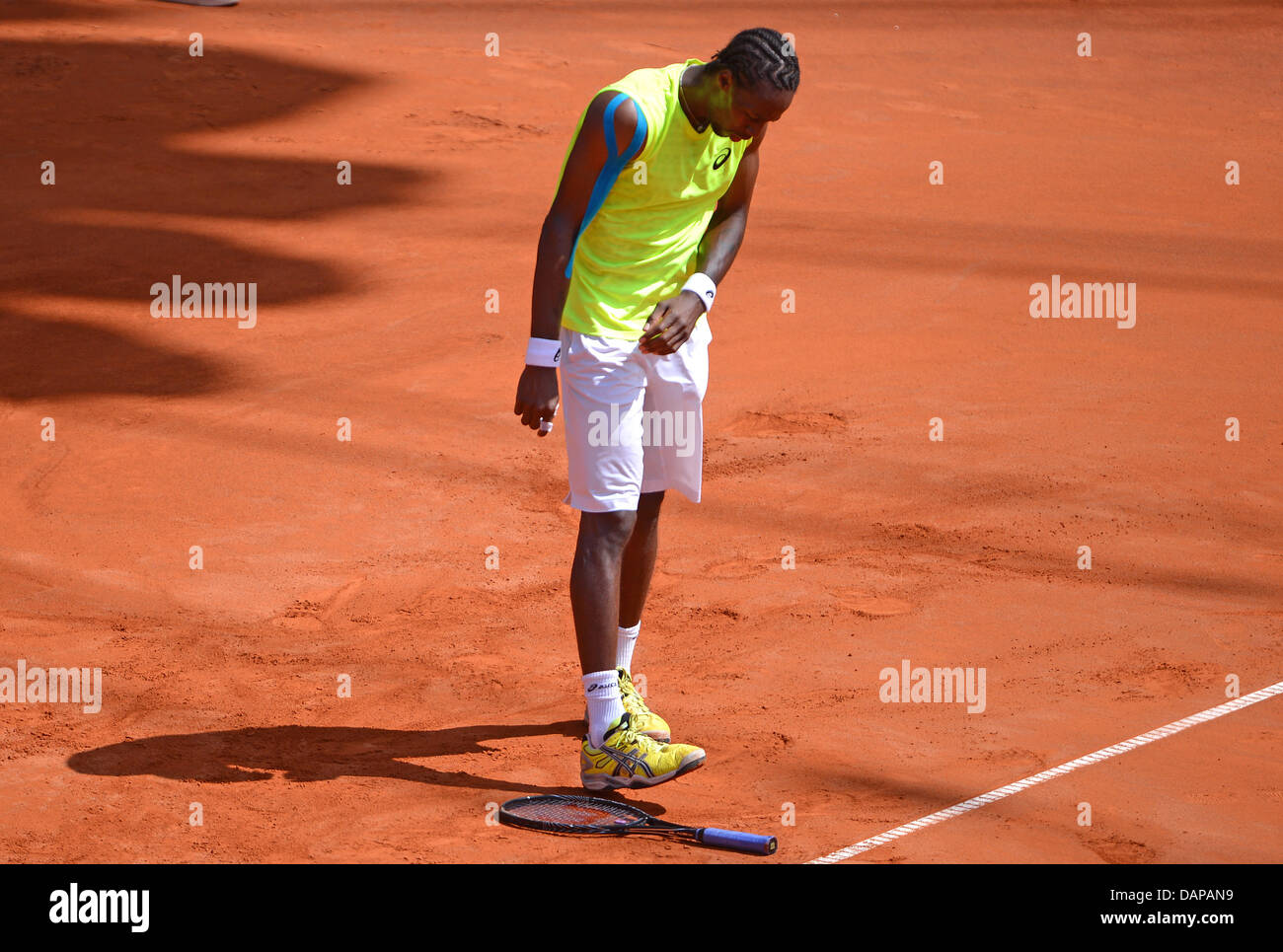 Hamburg, Germany. 17th July, 2013. France's Gael Monfils steps on his ...