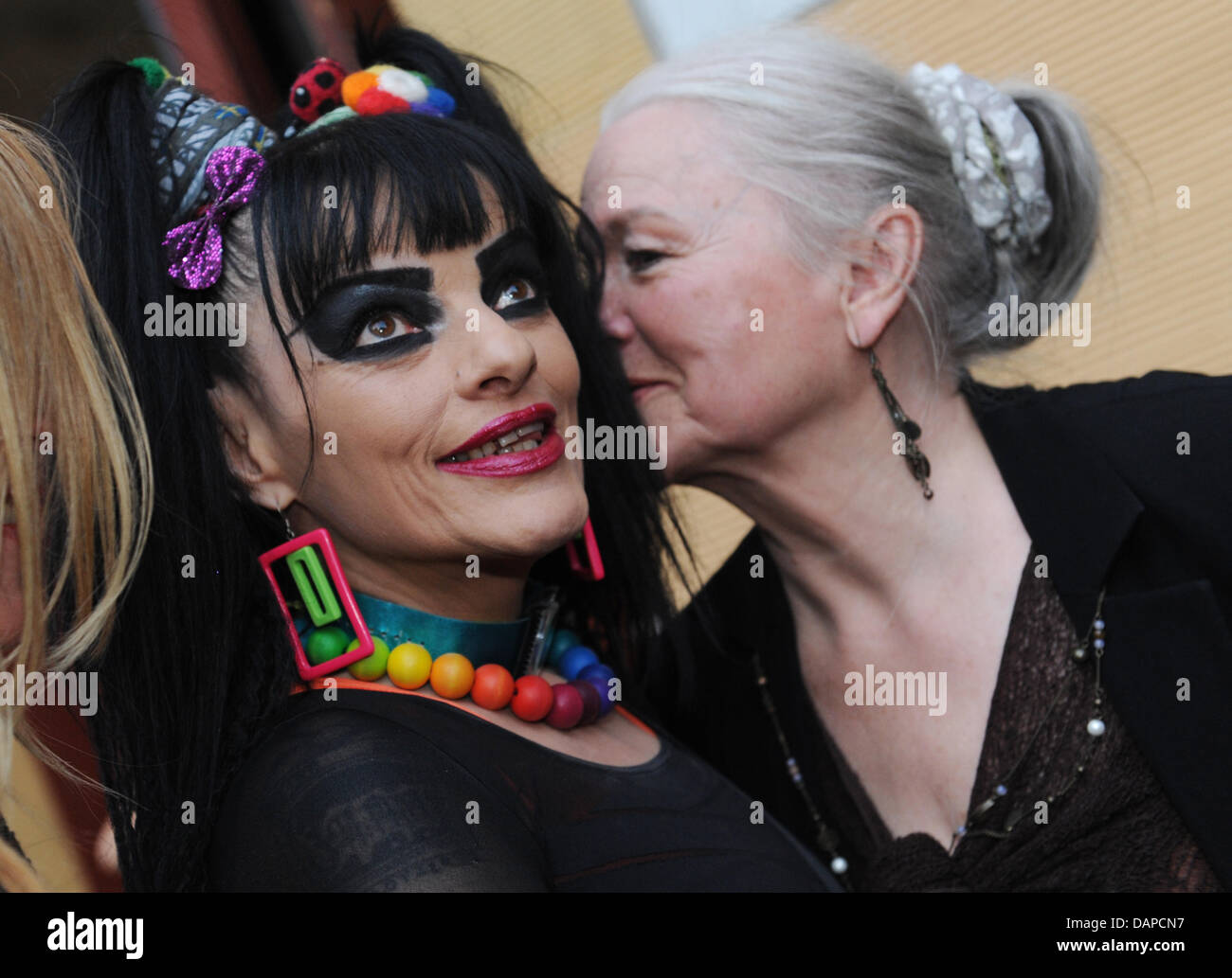 Prior to the pre-premiere of the documentary movie 'Nina Hagen - Godmother of Punk' the protagonist Nina Hagen and her mother Eva-Maria Hagen stand in front of the Babylon Cinema in Berlin, Germany, 11 August 2011. The television premiere will be on 16 August 2011. Photo: Rainer Jensen Stock Photo
