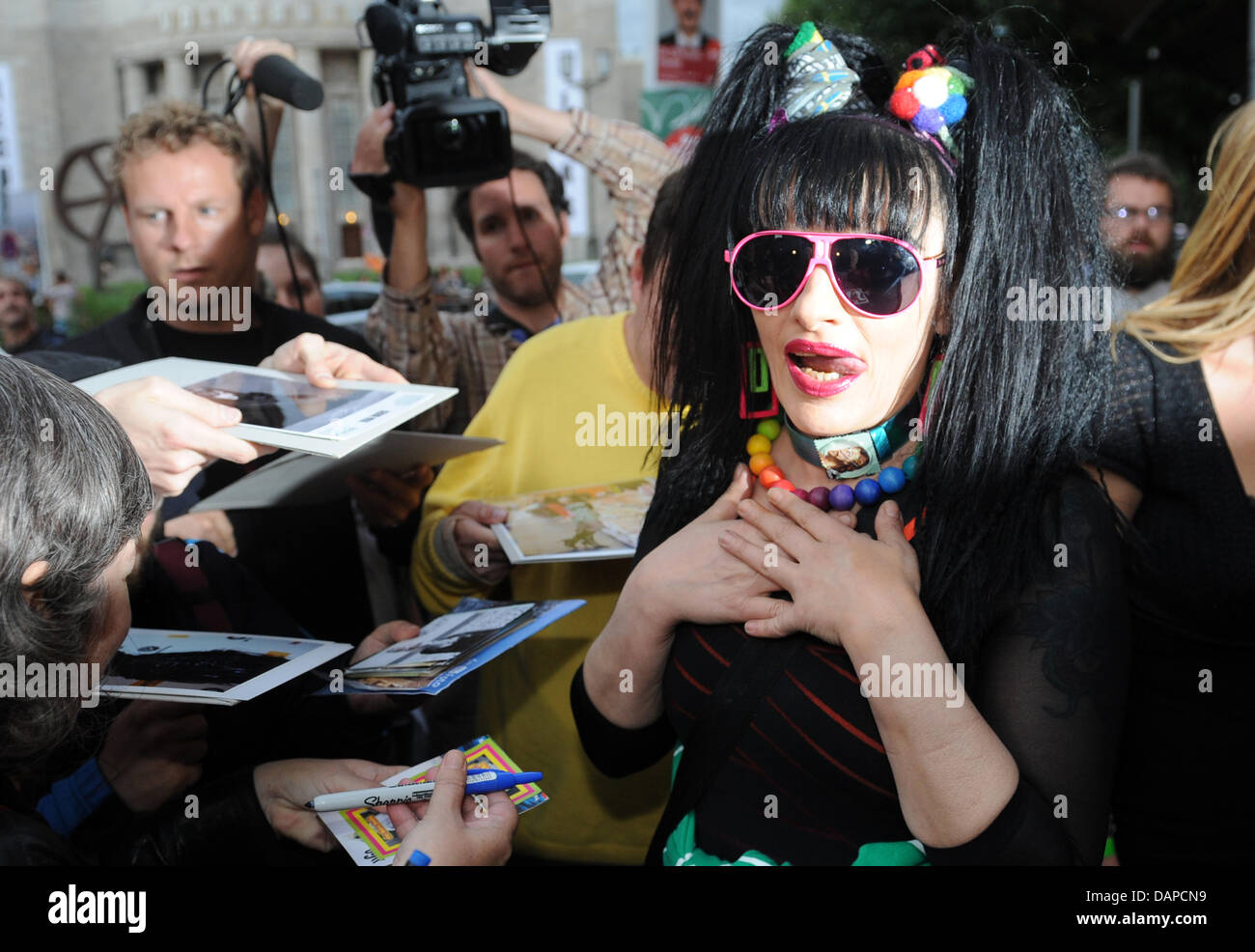 Prior to the pre-premiere of the documentary movie 'Nina Hagen - Godmother of Punk' the protagonist Nina Hagen stands in front of the Babylon Cinema in Berlin, Germany, 11 August 2011. The television premiere will be on 16 August 2011. Photo: Rainer Jensen Stock Photo