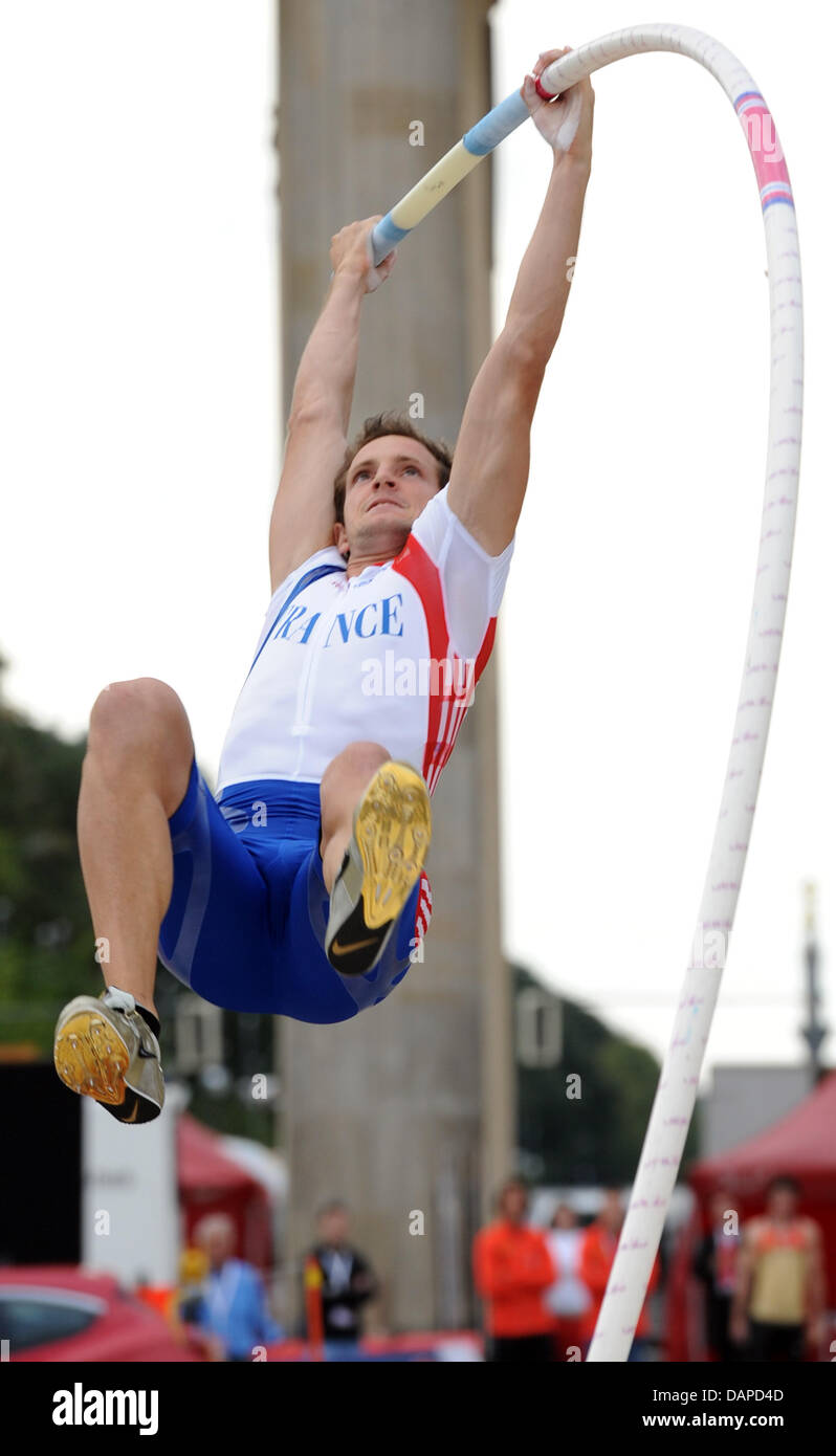 France's Renaud Lavillenie (European champion in the pole vault) jumps the bar in front of the