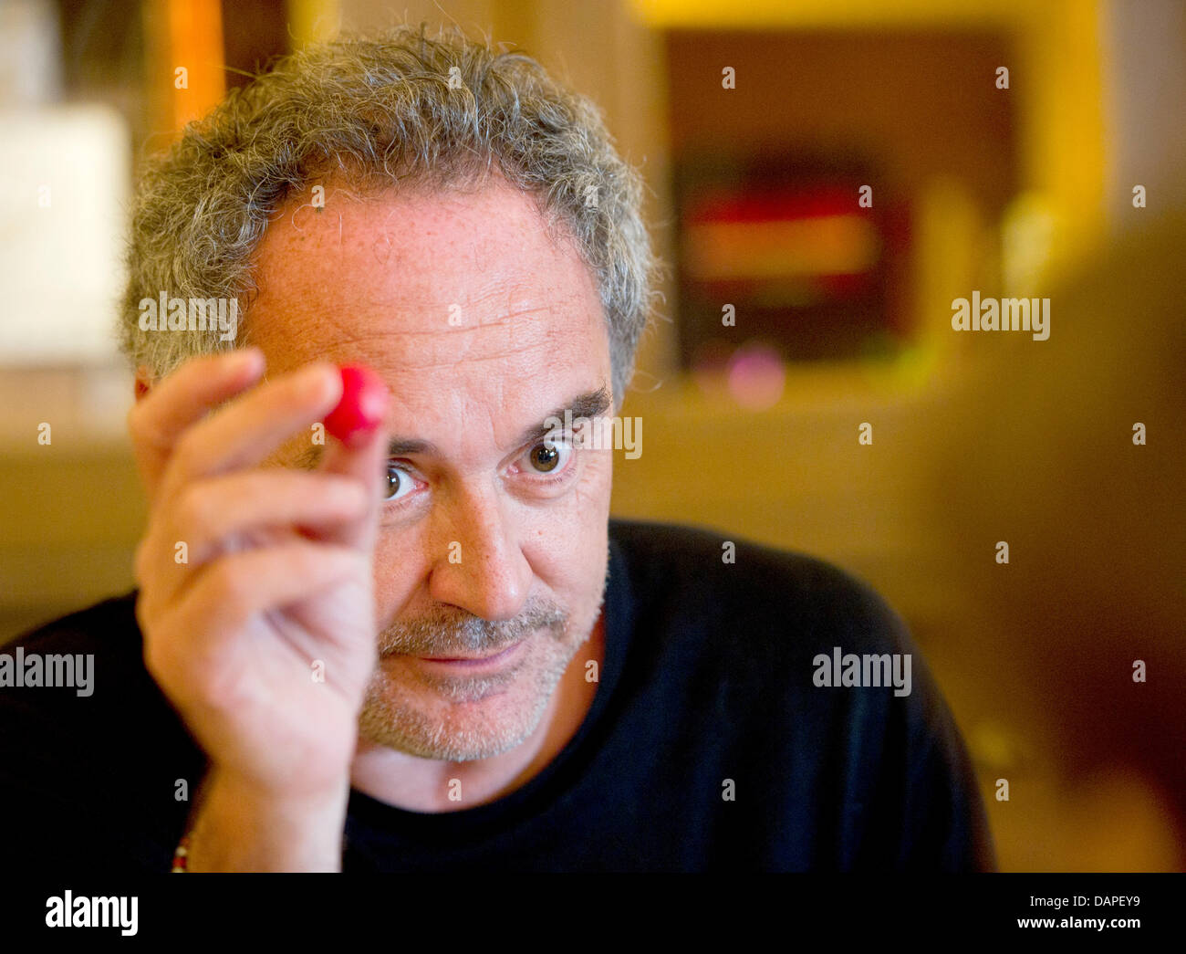 Spanish 3-star chef Ferran Adria speaks at a restaurant during a meeting of top chefs in Munich, Germany, 16 August 2011. The meeting is taking place on the occassion of the presentation of the documentary film 'El Bulli - Cooking In Progress', which appears in German cinemas on 15 September 2011. Photo: PETER KNEFFEL Stock Photo