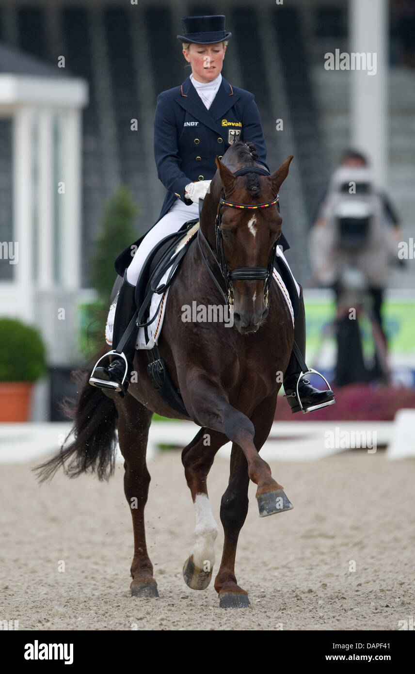 German dressage rider Helen Langehanenberg rides her horse Damon Hill