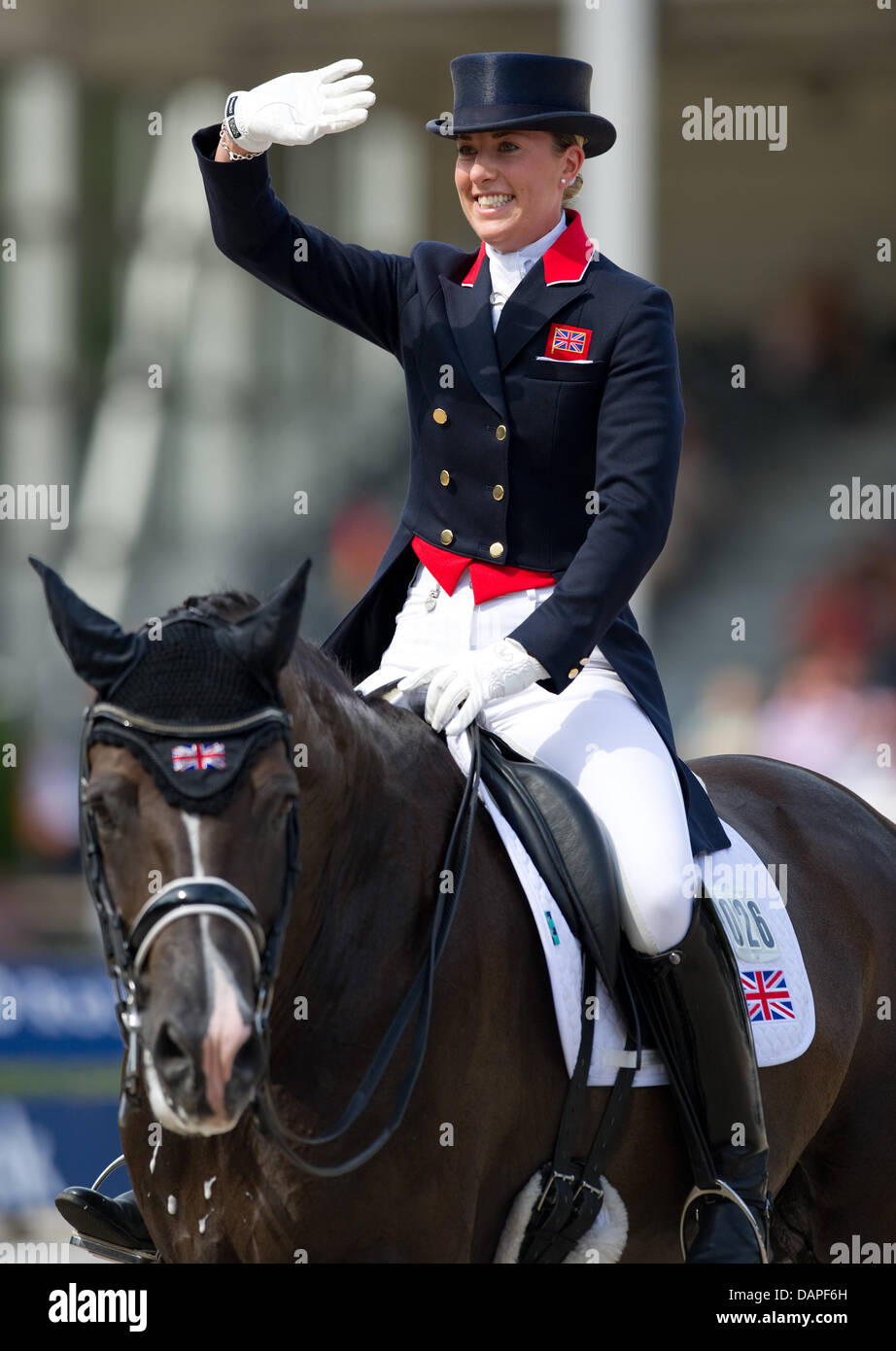 British dressage rider Charlotte Dujardin smiles on her horse Valegro