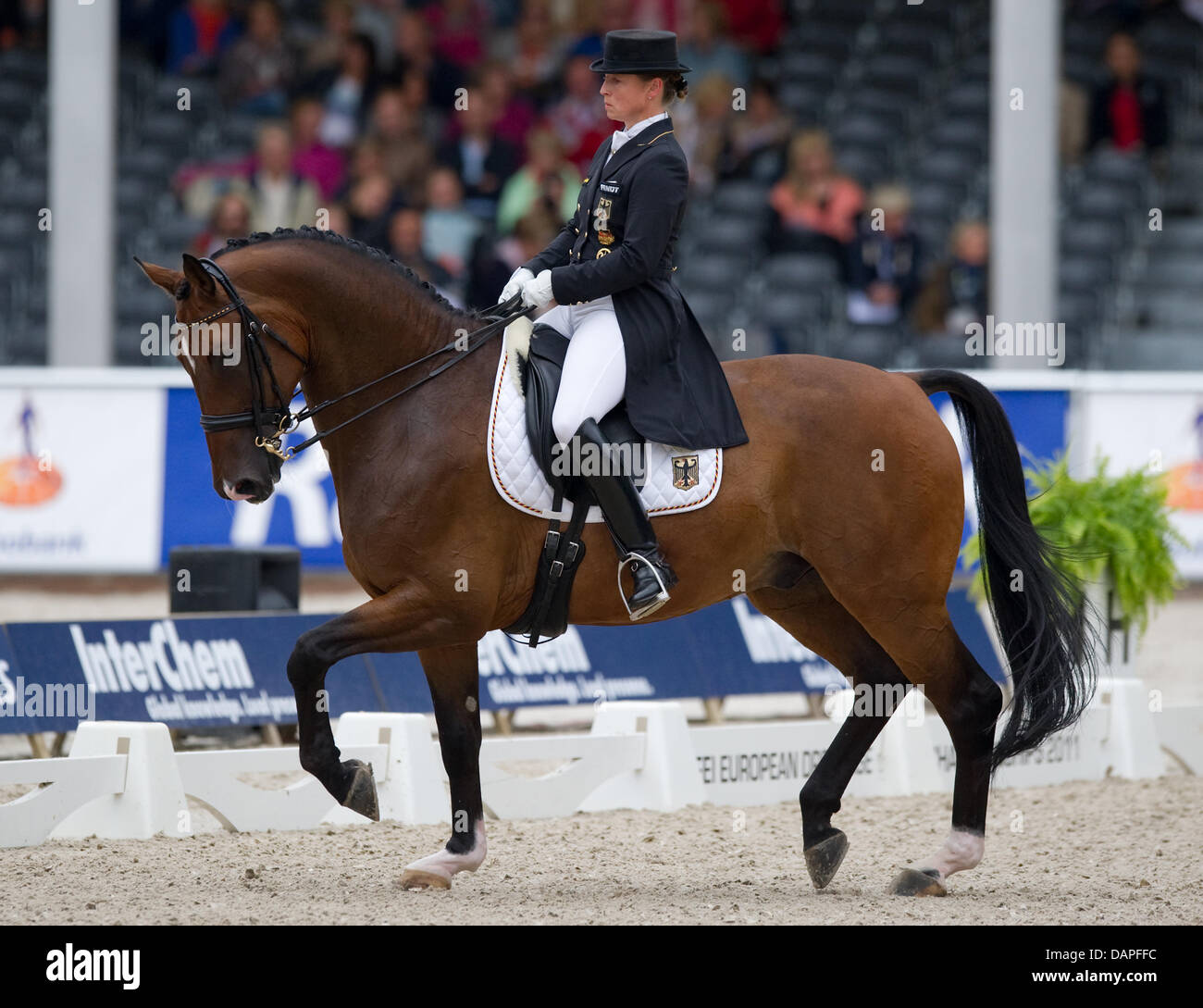 German dressage rider Isabell Werth performs her skills with her horse