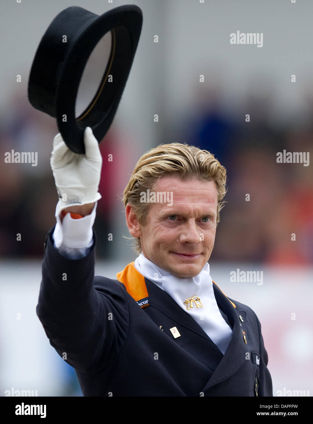 Dutch Dressage Rider Edward Gal Waves During The Team Competition Of