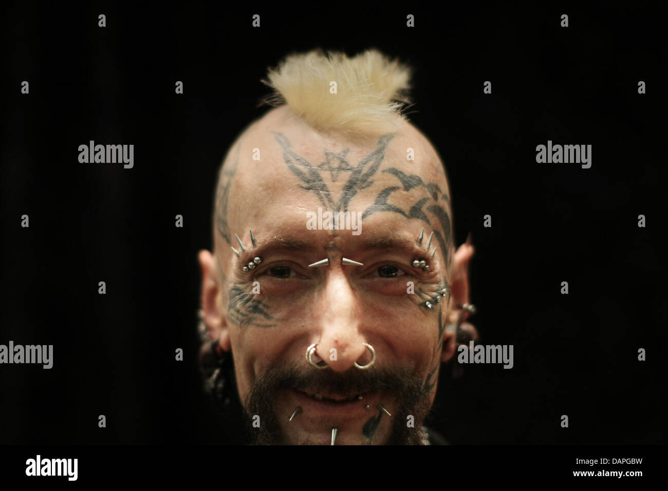 Piercing artist Heavy smiles at the Rheingoldhalle in Mainz, Germany, 19 August 2011. From 19 to