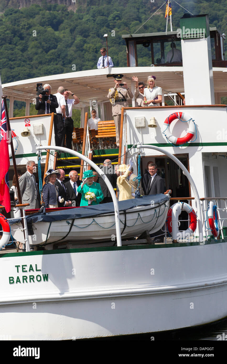 Windermere, UK. 17th July 2013.  Her Majesty the Queen & The Princess Royal on a visit to Lake Windermere. They met members of Windermere Lake Cruise before embarking on steamer The Teal for a sightseeing tour of the lake. She disembarked at Brockhole the National Park Visitors centre. Nigel Wilkinson, managing director of Windermere Lakes Cruises, said: 'Following an invitation from the Lord Lieutenant, we are extremely proud to have been given the honour of welcoming Her Majesty the Queen and Her Royal Highness the Princess Royal to Windermere.' Credit:  Shoosmith Collection/Alamy Live News Stock Photo