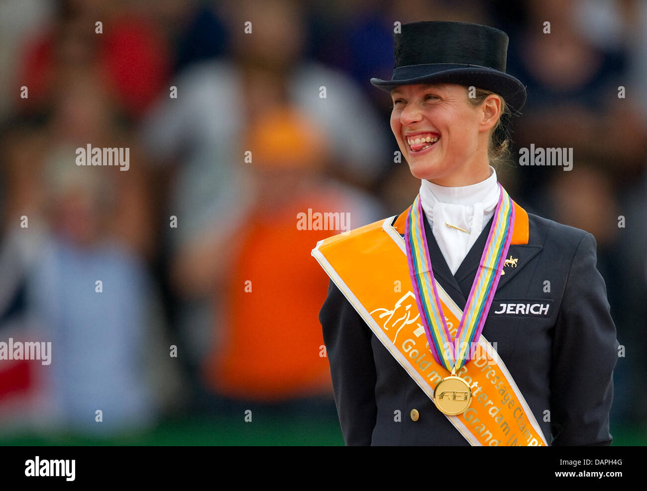 Dutch Adelinde Cornelissen smiles during award ceremony of the Grand Prix Special at the European Dressage Championship in Rotterdam, Netherlands, 20 August 2011. Cornelissen took first place. Photo: Uwe Anspach Stock Photo
