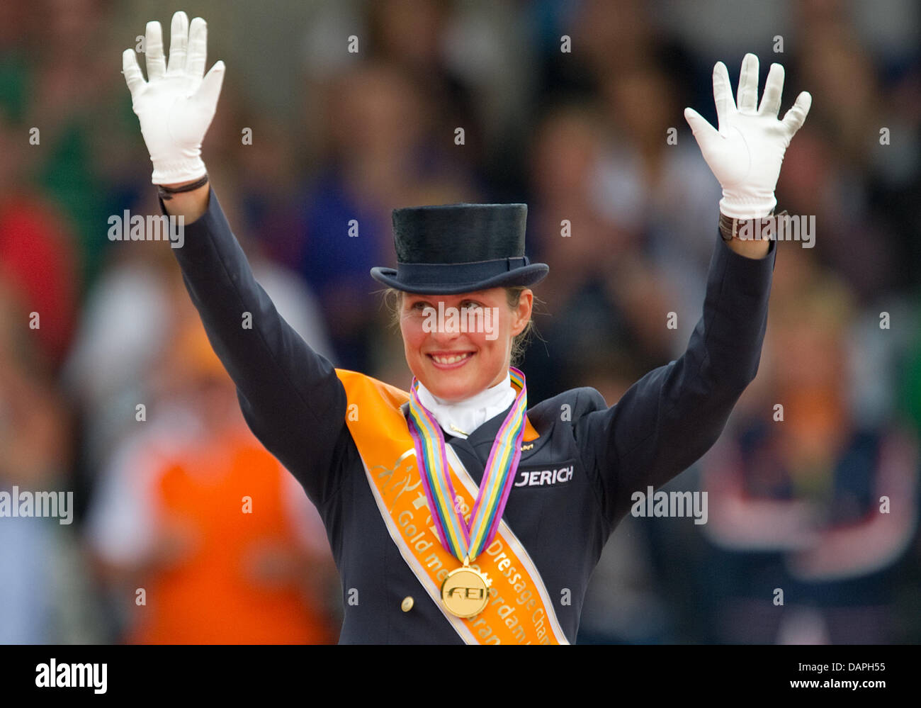 Dutch Adelinde Cornelissen waves and smiles during the award ceremony of the Grand Prix Special at the European Dressage Championship in Rotterdam, Netherlands, 20 August 2011. Cornelissen took first place. Photo: Uwe Anspach Stock Photo