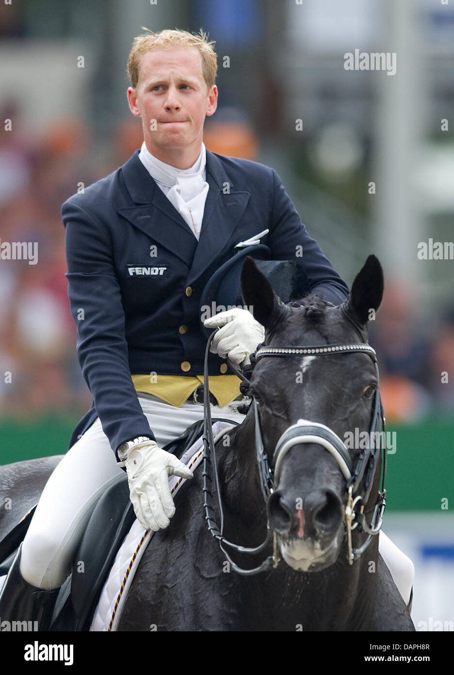 German dressage rider Matthias Alexander Rath srides his horse Totilas