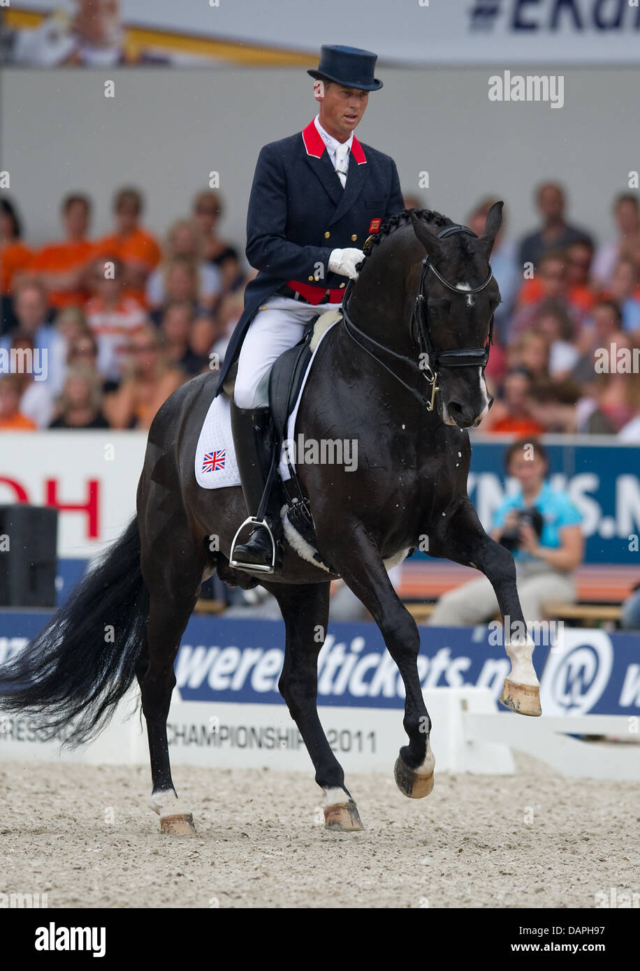 British dressage rider Carl Hester rides his horse Uthopia during the