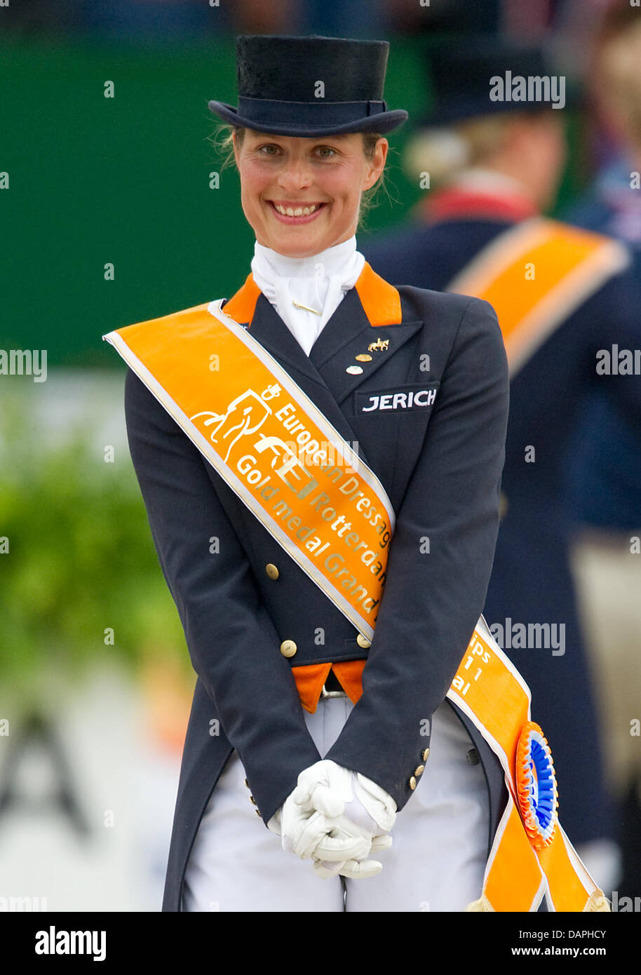 Dutch equestrian Adelinde Cornelissen smiles  during the award ceremony of the Grand Prix Special at the European Dressage Championship in Rotterdam, Netherlands, 20 August 2011. Cornelissen took first place. Photo: Uwe Anspach Stock Photo