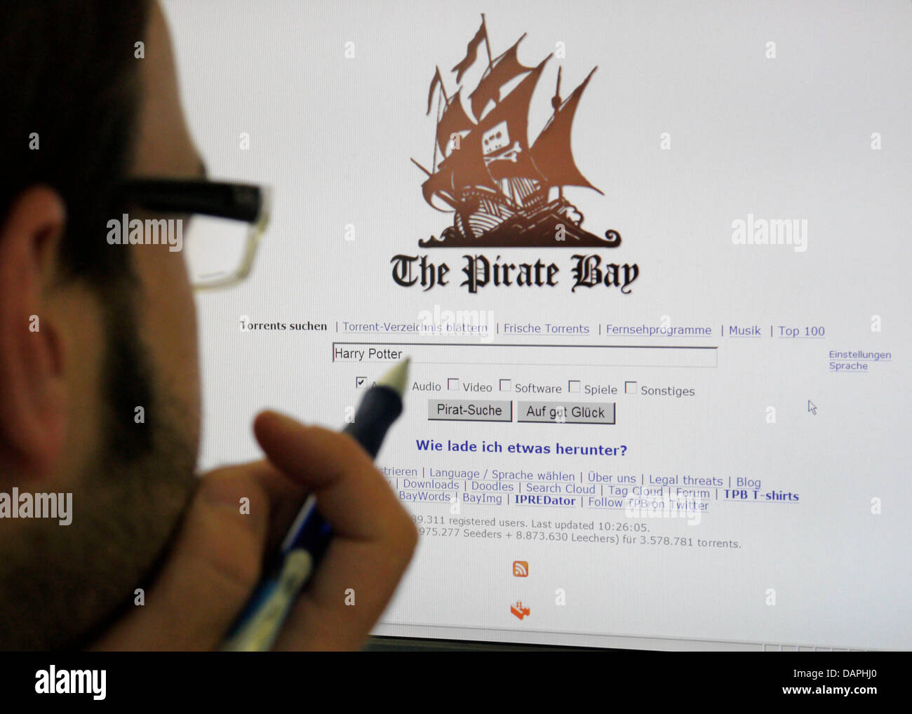 The Pirate Bay website shot against a bookcase background