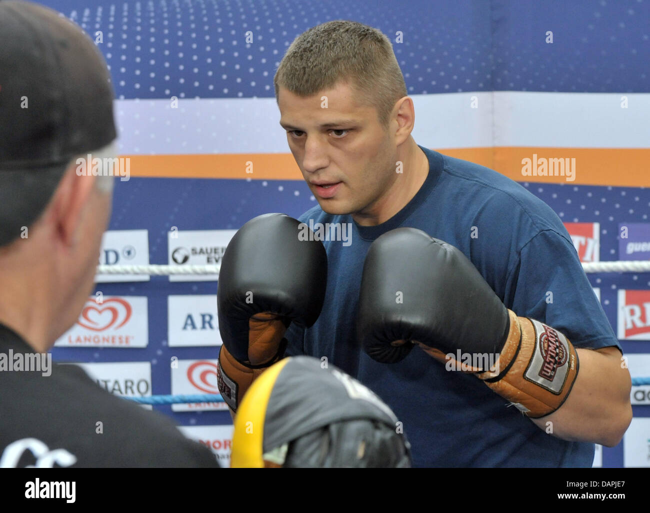 Professional boxer Siarhei Liakhovich (Belarus) practices with his coach  Kenneth Weldon during a public practice session before the WBA/WBO  heavyweight intercontinental championship at the exhibition hall in Erfurt  in Erfurt, Germany, 23
