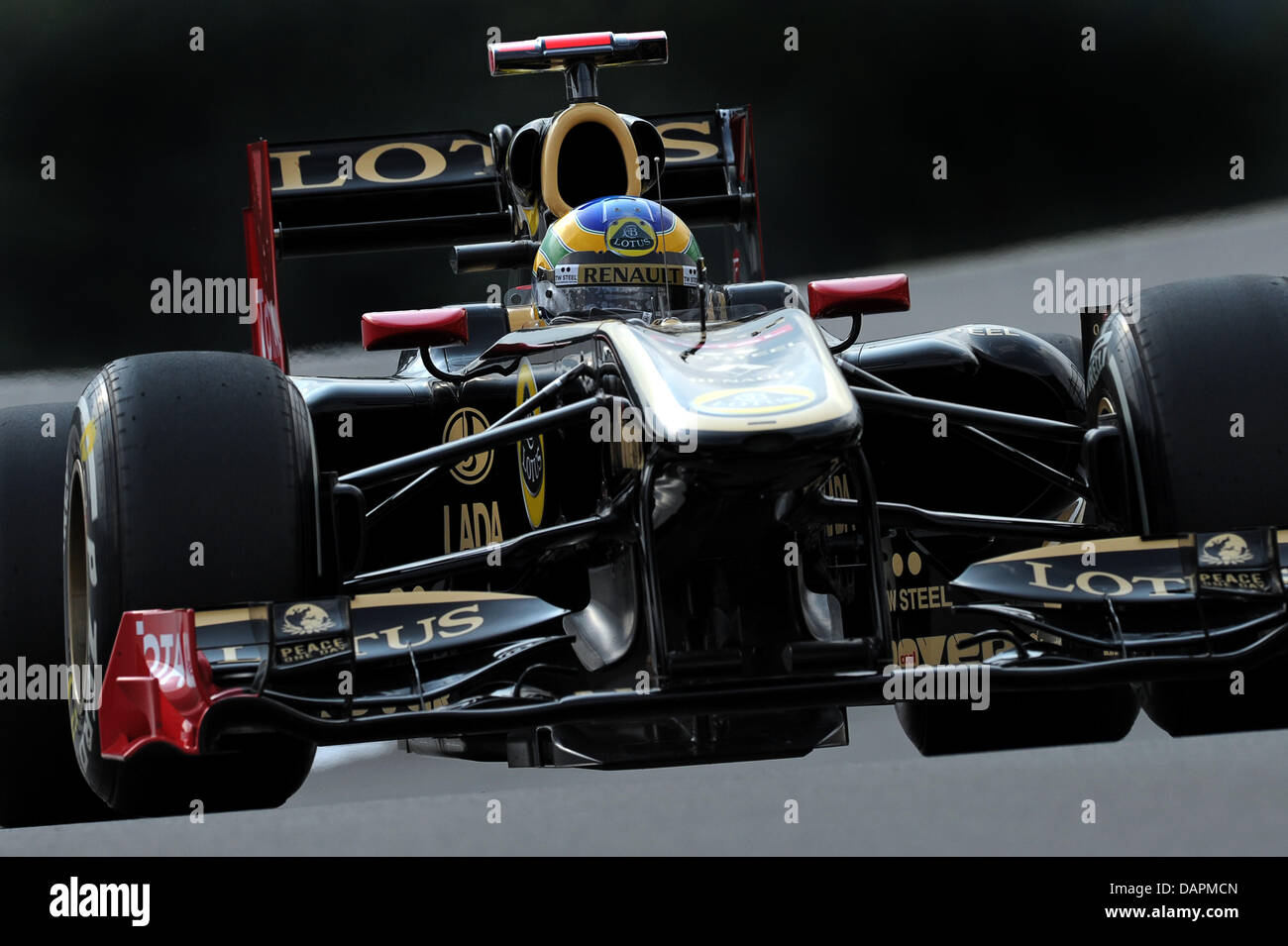 Brazilian Formula One driver Bruno Senna of Lotus Renault steers his