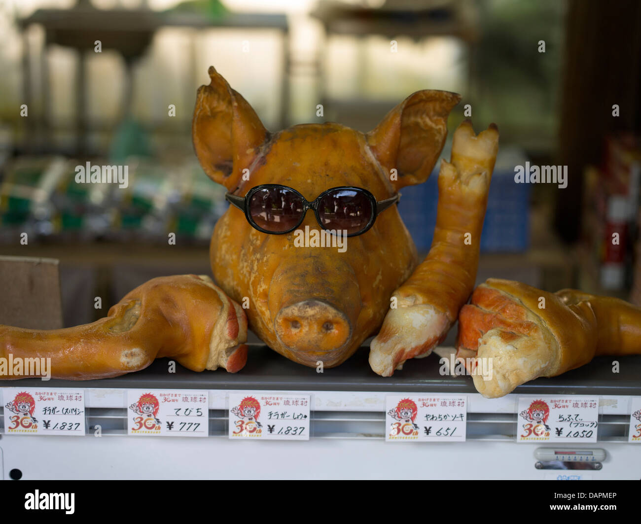 Pig faces and trotters for sale in Okinawa, Japan Stock Photo Alamy