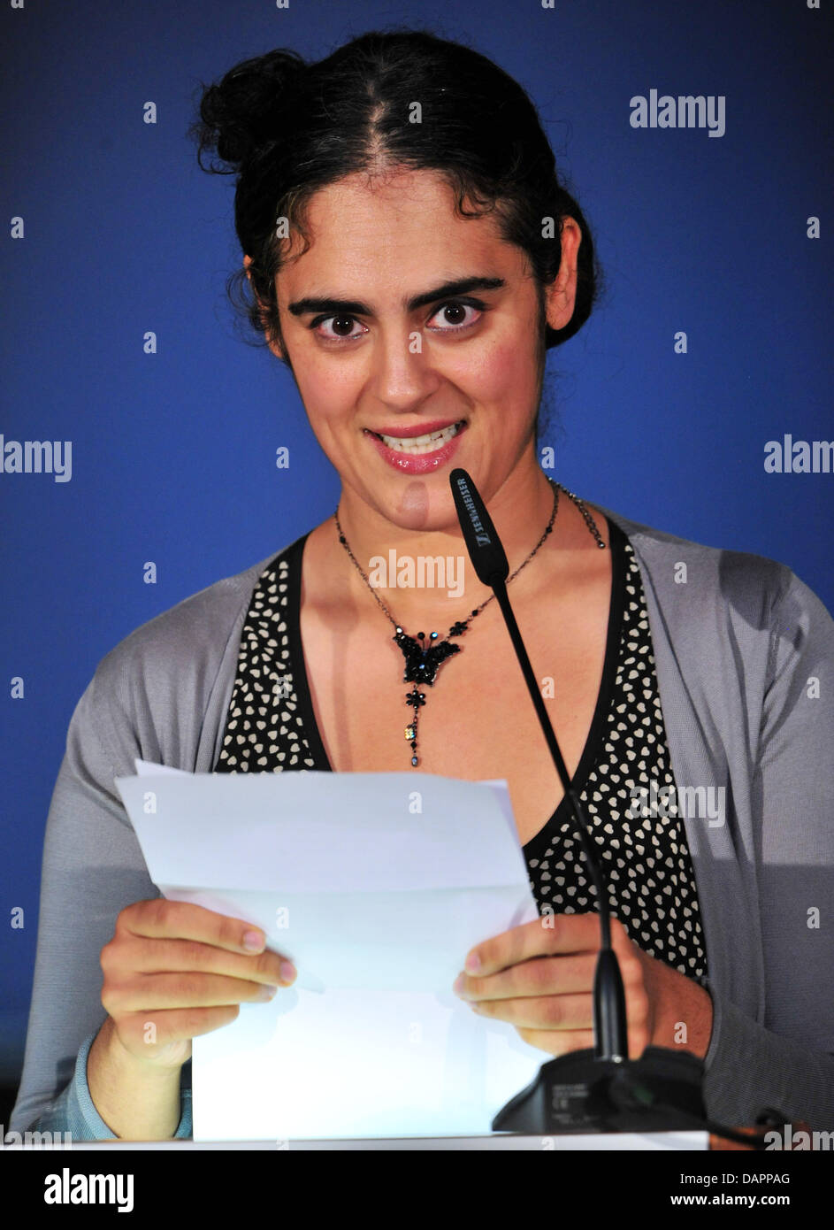 French actress Shaghayeg Beheshti accepts the Goethe Medal on behalf of the theater artist Ariane Mnouchkine in Weimar, Germany, 28 August 2011. The Goethe Medal was founded in 1954 and has been accepted as an official order by the Federal Republic of Germany since 1975. This year's medal goes to three important Europeans. Photo: Martin Schutt Stock Photo