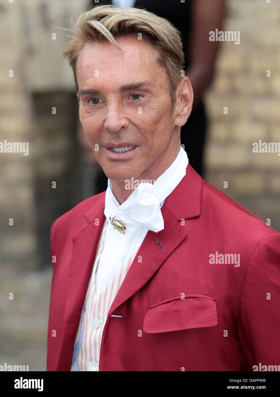 Designer Wolfgang Joop arrives for the church wedding of Georg