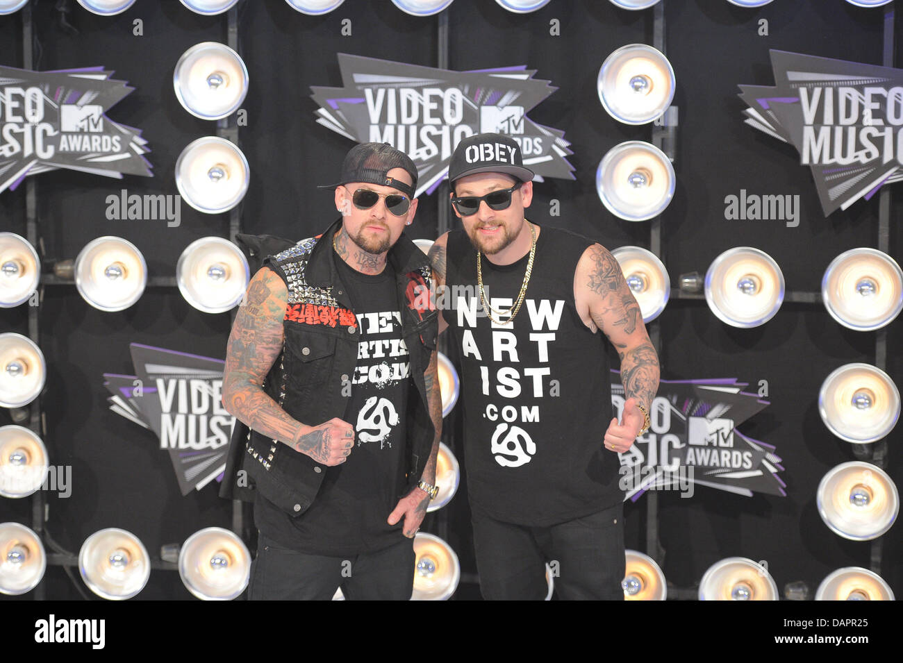 Musician brothers Joel Madden (l) and Benji Madden arrive at the 28th Annual MTV Video Music Awards at Nokia Theatre L.A. Live in Los Angeles, USA, on 28. August, 2011. Photo: Hubert Boesl Stock Photo