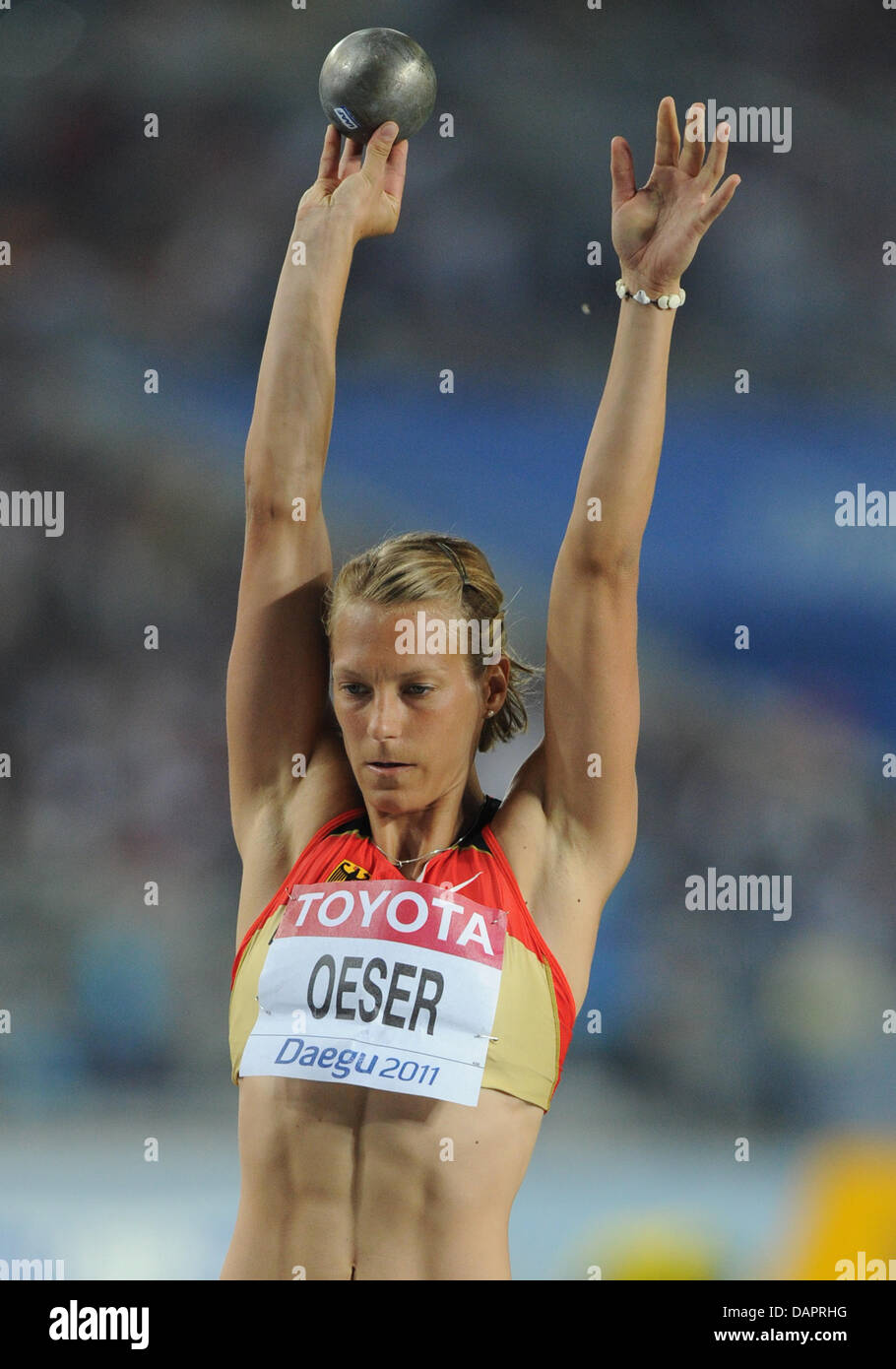 Jennifer Oeser of Germany competes in the Shot Put event of the Heptathlon competition at the 13th IAAF World Championships in Athletics in Daegu, Republic of Korea, 29 August 2011. Photo: Rainer Jensen dpa  +++(c) dpa - Bildfunk+++ Stock Photo