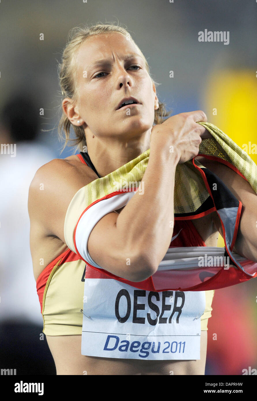 Jennifer Oeser of Germany reacts in the Shot Put event of the Heptathlon competition at the 13th IAAF World Championships in Athletics in Daegu, Republic of Korea, 29 August 2011. Photo: Rainer Jensen dpa  +++(c) dpa - Bildfunk+++ Stock Photo