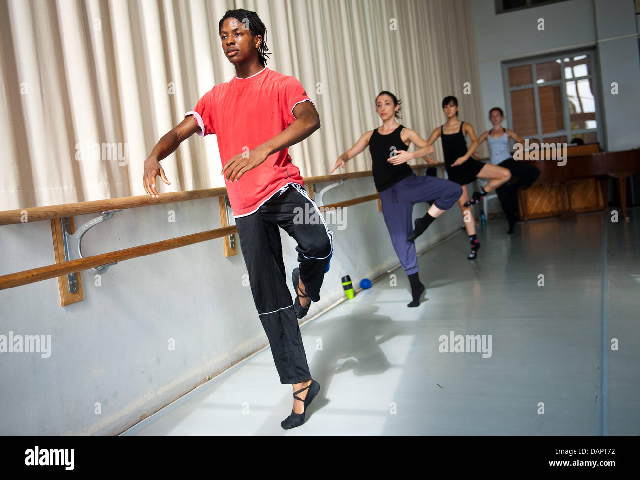 Ballet dancer Jamie Mejeh practices with the Saarland State Theatre-based Donlon Dance Company in Saarbruecken, Germany, 23 August 2011. On 01 September 2011, the 18-year-old will begin his training at the School of Music and Dramatic Arts in Frankfurt even though he has only been a ballet dancer for the past 17 months. Prior to that Mejeh had been a hip hop dancer. Photo: Oliver D Stock Photo