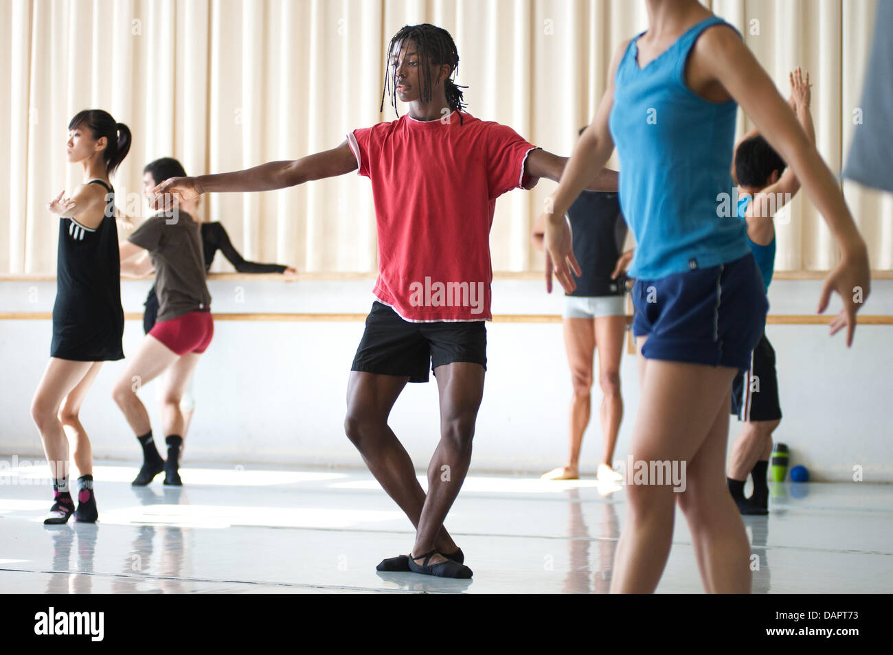 Ballet dancer Jamie Mejeh (M) practices with the Saarland State Theatre-based Donlon Dance Company in Saarbruecken, Germany, 23 August 2011. On 01 September 2011, the 18-year-old will begin his training at the School of Music and Dramatic Arts in Frankfurt even though he has only been a ballet dancer for the past 17 months. Prior to that Mejeh had been a hip hop dancer. Photo: Oliv Stock Photo