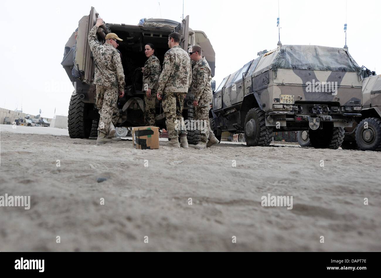 German soldiers prepare a mission at the Bundeswehr camp in Kundus ...