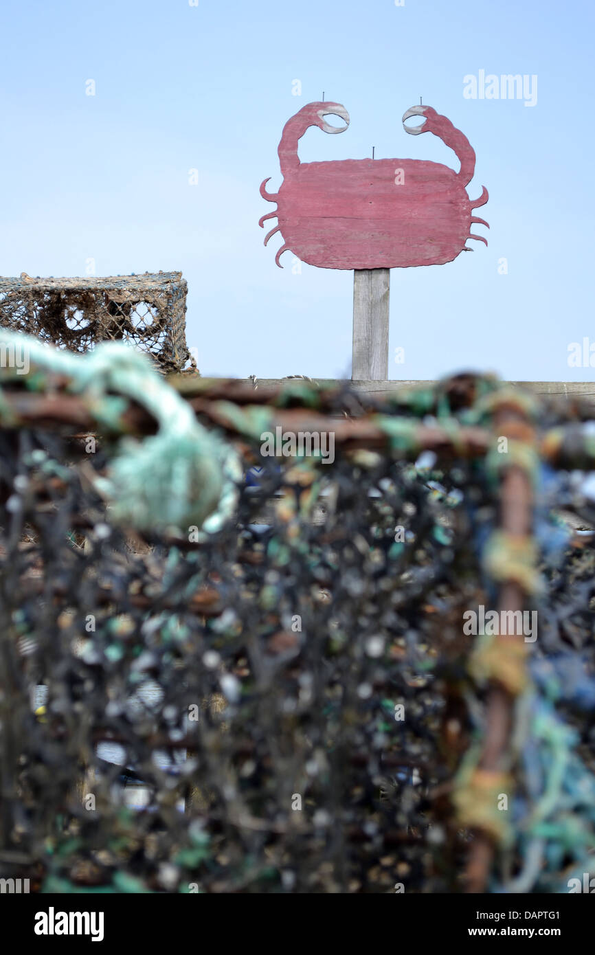 Crab sign and crab nets, Blakeney Channel, Norfolk. Stock Photo