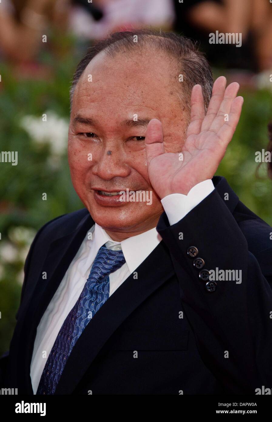Director John Woo arrives at the premiere of 'The Ides Of March' during the 68th Venice International Film Festival at Palazzo de Cinema in Venice, Italy, 31 August 2011. Photo: Hubert Boesl Stock Photo