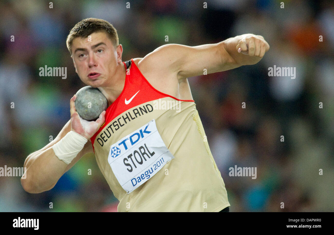 David Storl of Germany comepetes in the Shot Put final at the 13th IAAF World Championships in Daegu, Republic of Korea, 02 September 2011. He finished first place and won the gold medal. Photo: Bernd Thissen dpa  +++(c) dpa - Bildfunk+++ Stock Photo