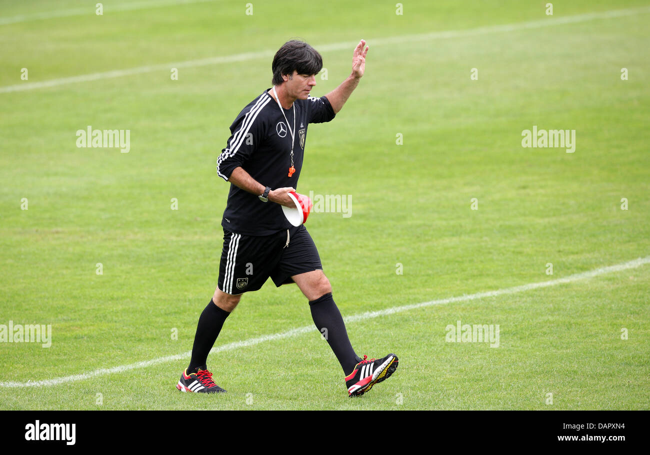 German national soccer team coach Joachim Loew gestures during a practice session at Paul Janes Stadium in Duesseldorf, Germany, 04 September 2011. On 06 September 2011, Germany will play Poland in a friendly match in Gdansk, Poland. Photo: Rolf Vennenbernd Stock Photo