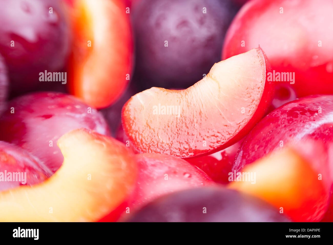 plum cut slice macro closeup Stock Photo Alamy