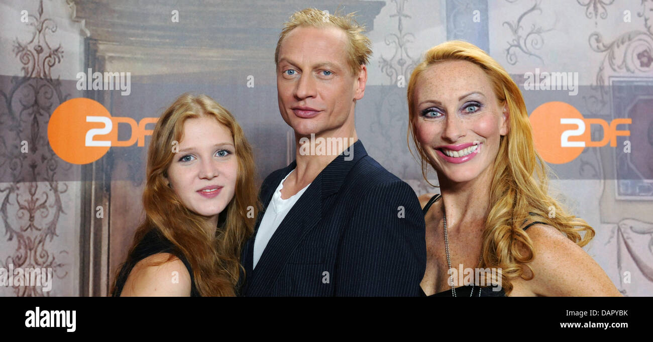 The actors Isolda Dychauk (L-R), Victor Schefe and Andrea Sawatzki pose during a photo session for the six-part tv programme 'Borgia' in Hamburg, Germany, 05 September 2011. On 17 October 2011, the public broadcaster ZDF presents the history of the family Borgia. The family became prominent during the Renaissance, because two of them were pope. Photo: Angelika Warmuth Stock Photo
