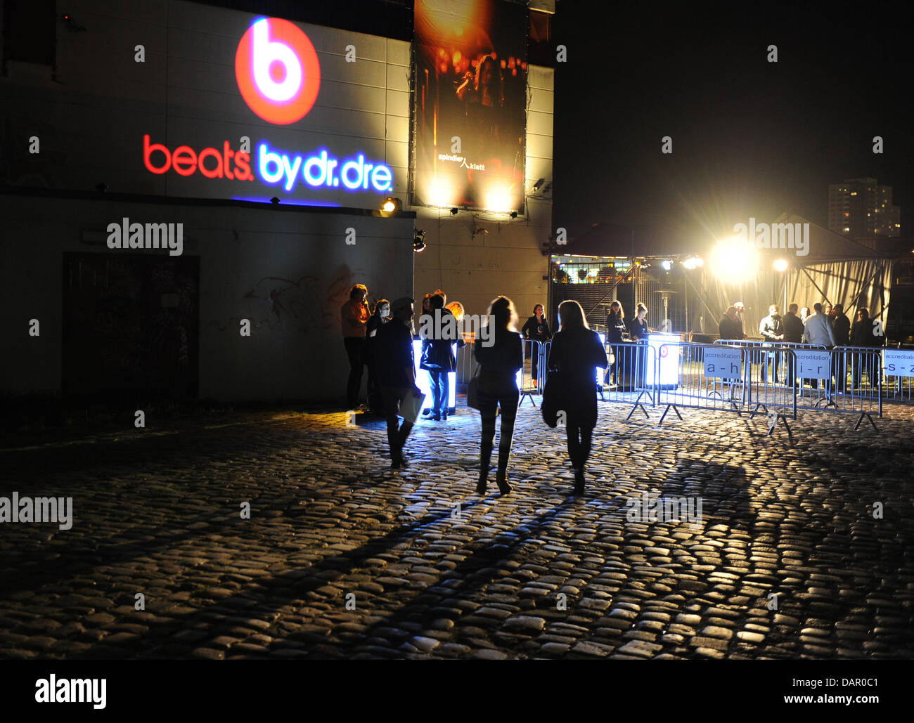 Guests arrive at the event 'Ibiza to Berlin' at the Spindler & Klatt club in Berlin, Germany, 06 September 2011. The label Beats by Dr. Dre Headphone held a launch party for new headphones. Photo: Jens Kalaene Stock Photo