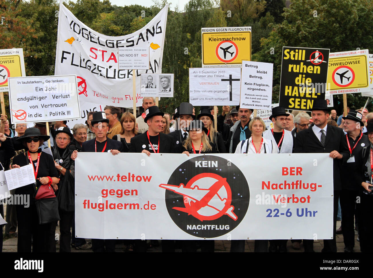 About 150 demonstrators hold banners during a street protest against noise pollution from BBI airport in Potsdam, Germany, 6 September 2011. The airport will be opened in the summer of 2012. Photo: Nestor Bachmann Stock Photo