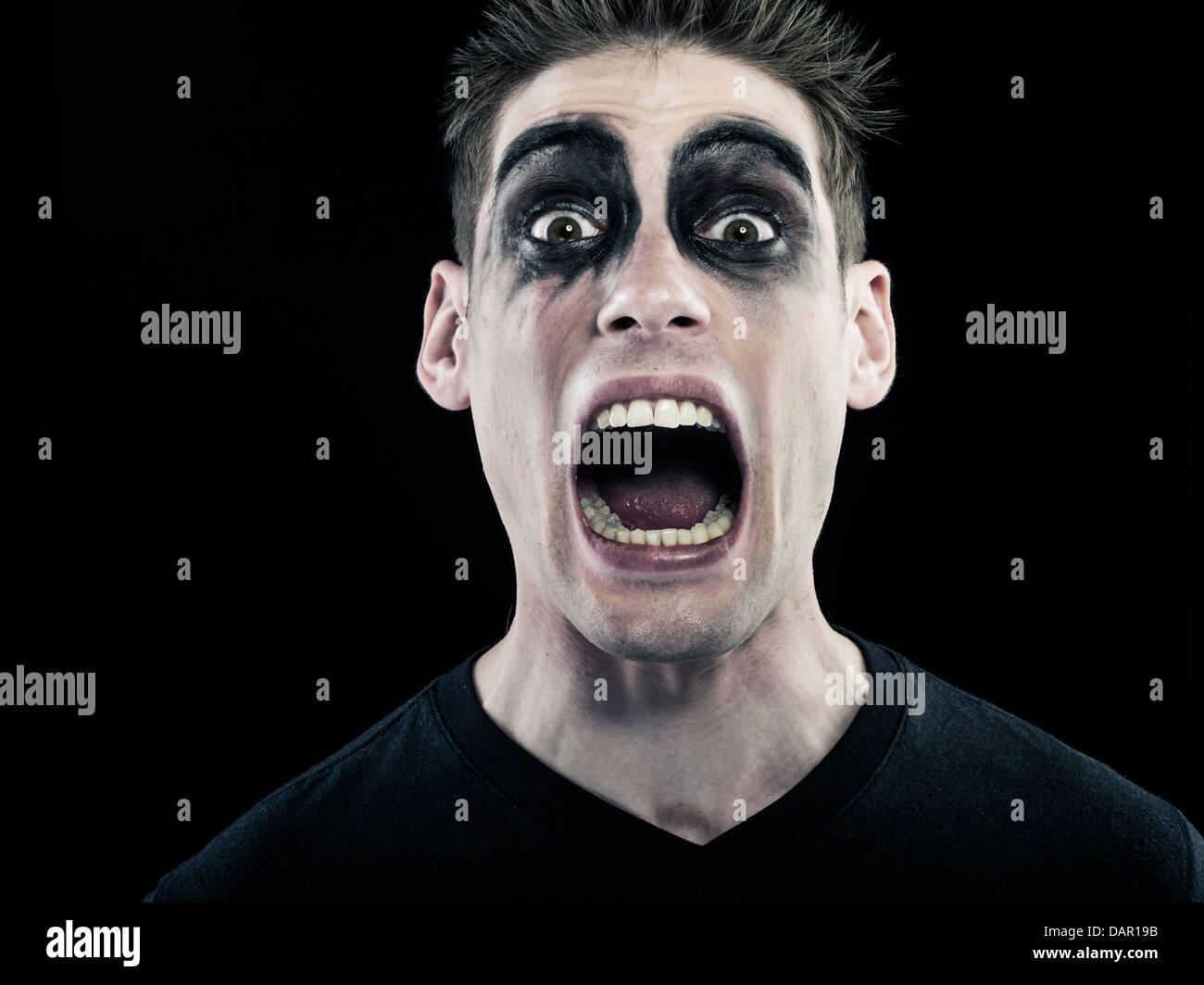 Scary man screaming Stock Photo