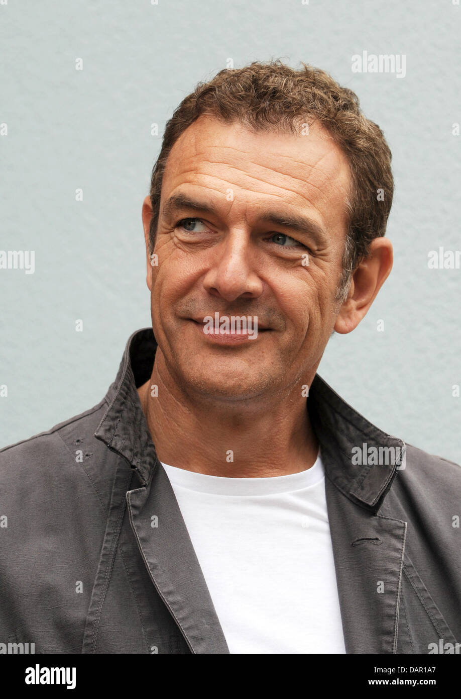 Actor Jean-Yves Berteloot as Marc von der Lohe poses during filming for the  German television broadcaster ZDF's production of "Ein Sommer im Elsass"  ("A Summer in Alsace") in Bergheim, France, 08 September