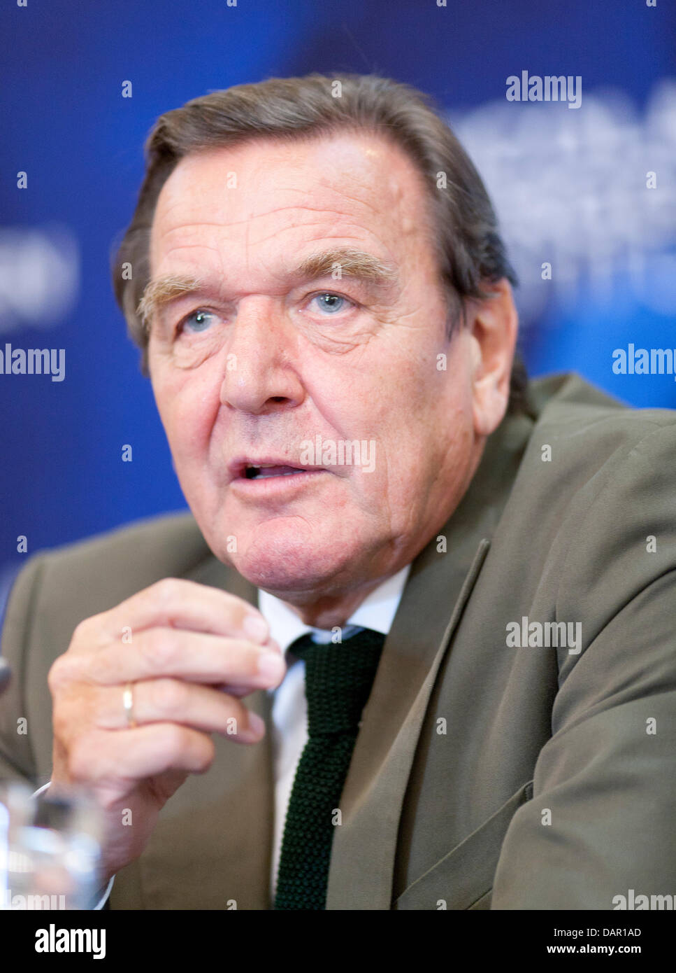 Former german Chancellor Gerhard Schröder talks to media during a press ...